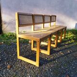 Four trendy tanned wooden chairs