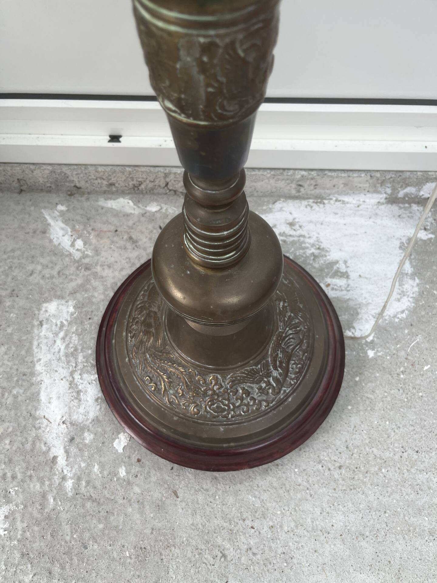 Brass floor lamp with an Orientalist wooden base.