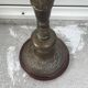 Brass floor lamp with an Orientalist wooden base.