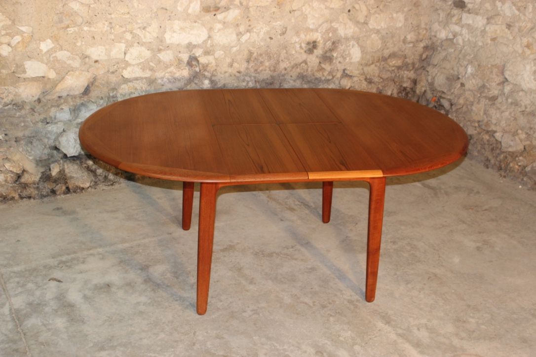 Scandinavian vintage teak dining table with 2 extension cords hidden by Svend Aage Madsen for Knudsen - Son, Denmark