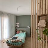 Lit corbeille en rotin vintage