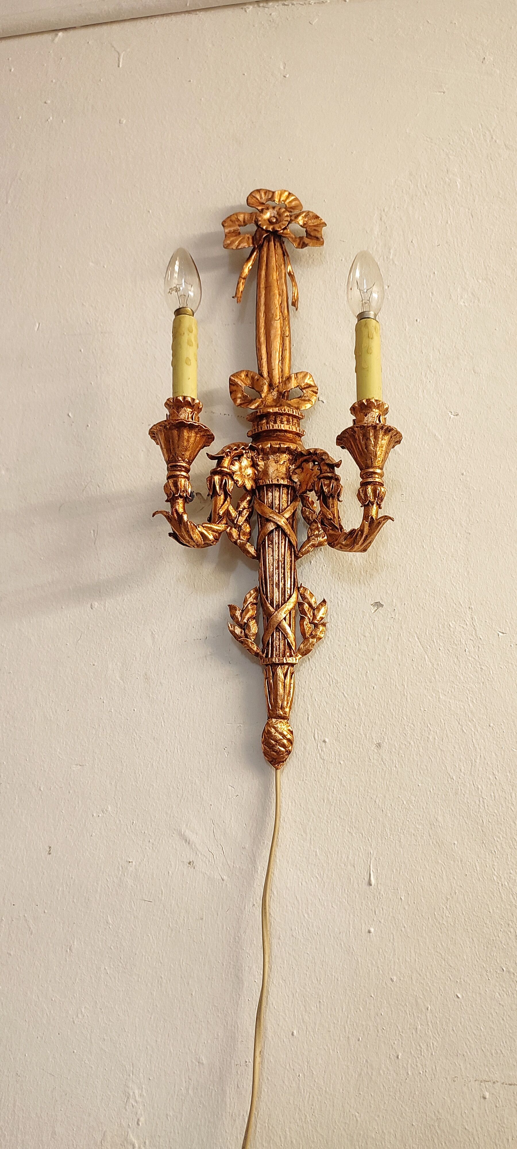 Wall lamp wrought iron and gold leaf. France, 1950s.