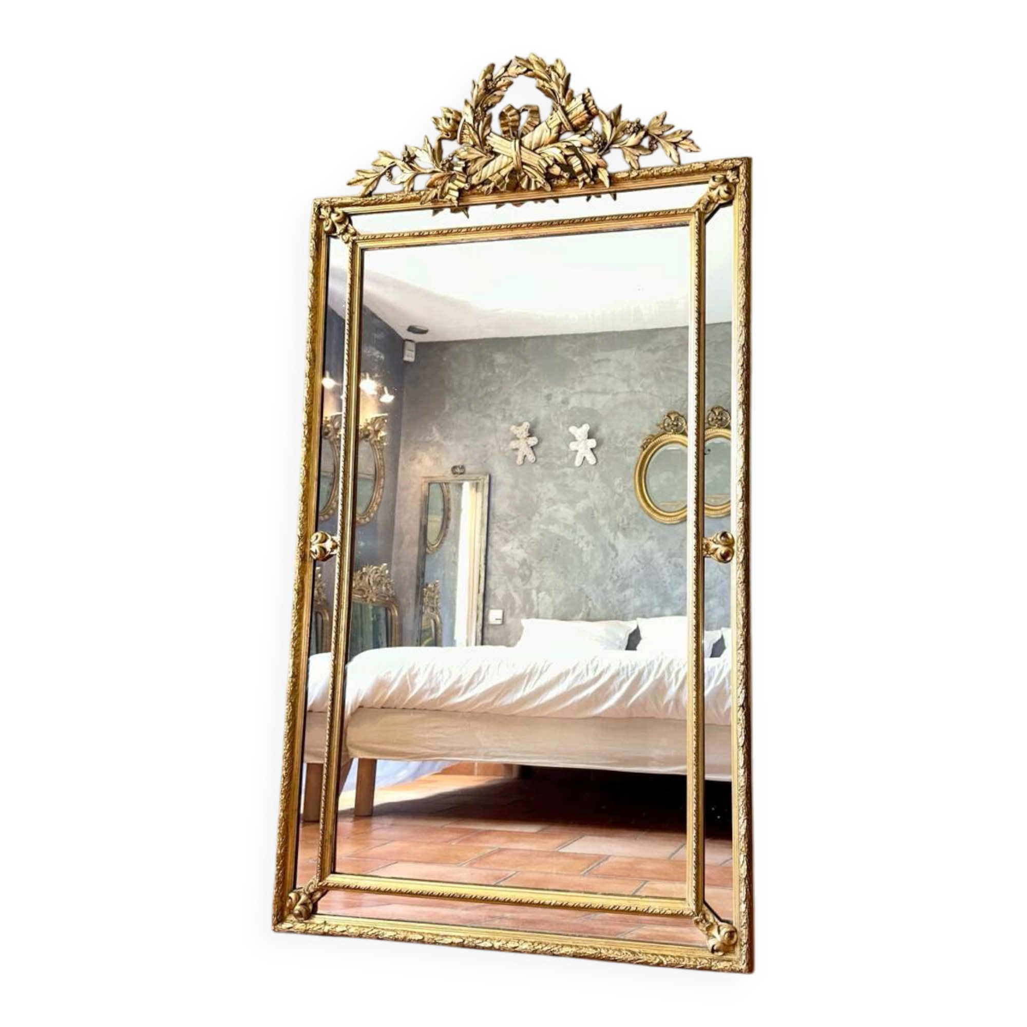 Antique gilded mirror with parcloses from the 19th century.