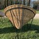 Pair of wicker "basket" armchairs