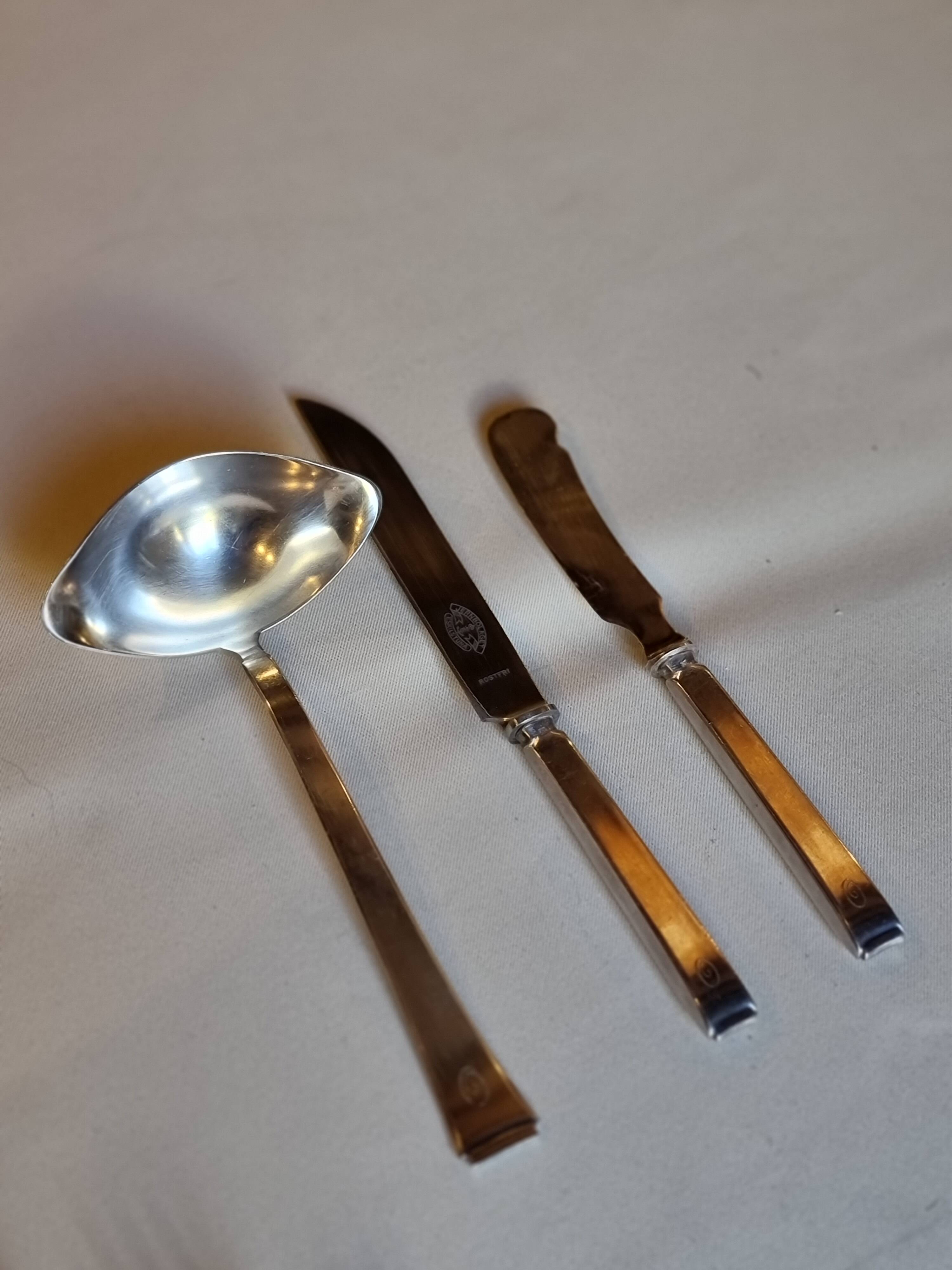 Scandinavian art deco housewife 1920 in monogrammed silver metal "O"