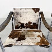 Pair of LC1 cow skin chairs by Le Corbusier for Cassina 1970