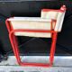Folding metal armchair