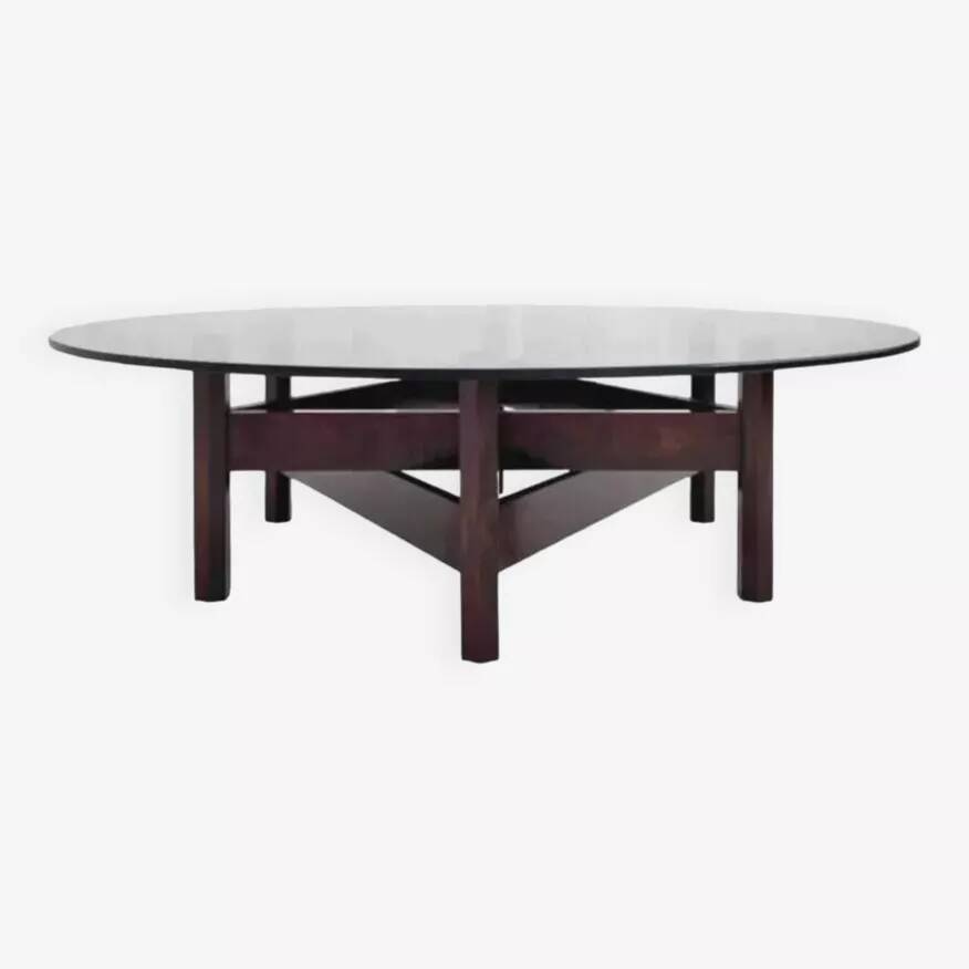 Wooden coffee table with round smoked glass top