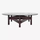 Wooden coffee table with round smoked glass top