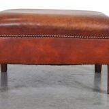 Leather ottoman in classic English style finished with decorative nails