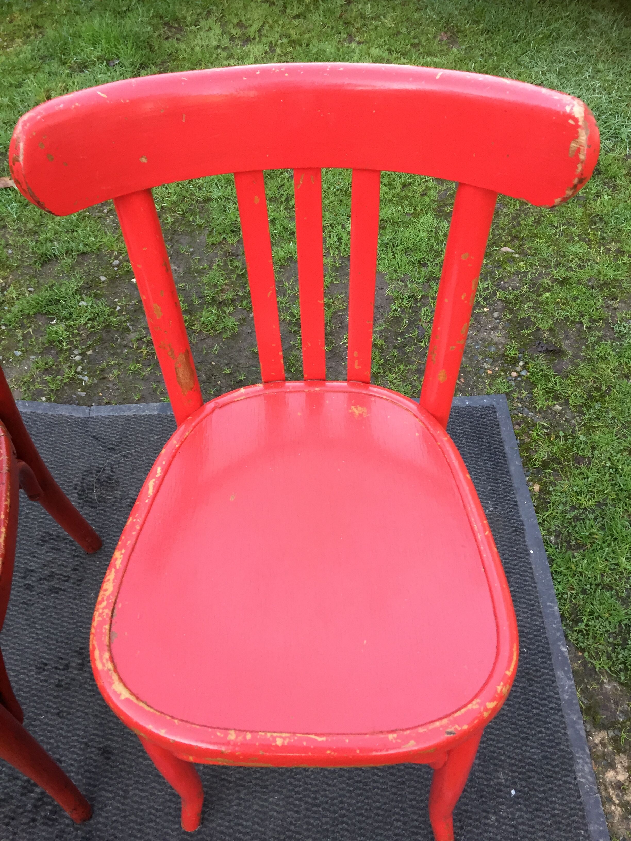 Vintage bistro chairs painted in burgundy and red