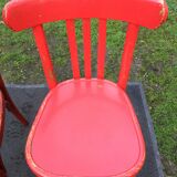 Vintage bistro chairs painted in burgundy and red