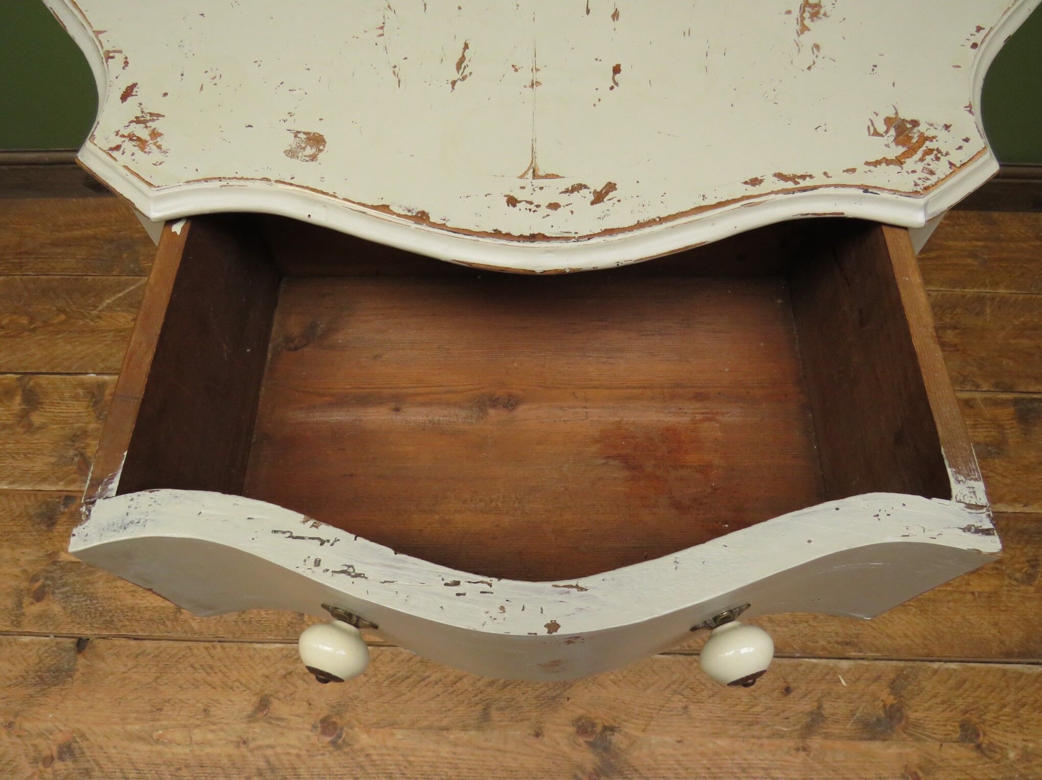 French serpentine chest of drawers