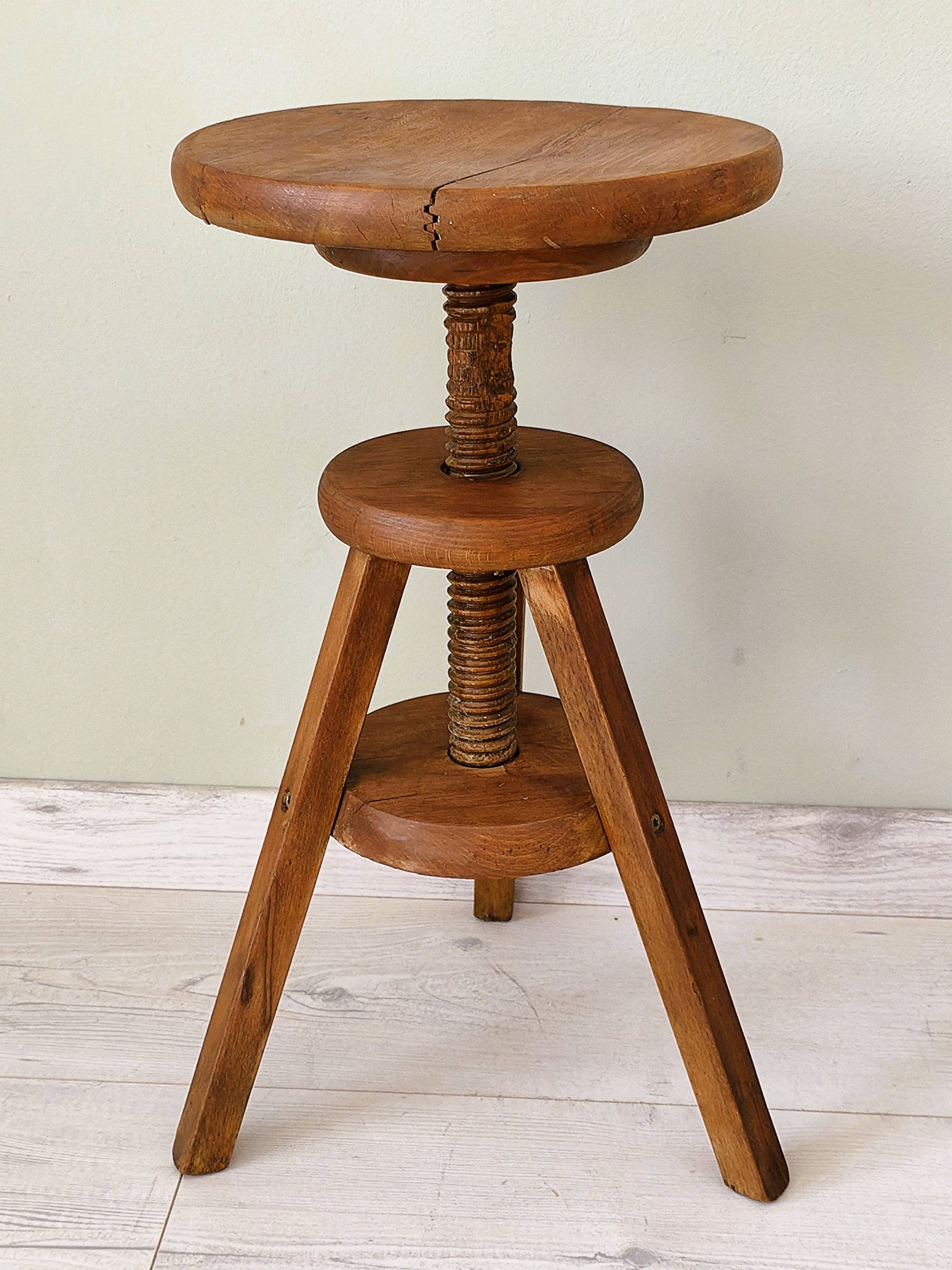 Adjustable vintage workshop stool made of solid wood