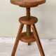 Adjustable vintage workshop stool made of solid wood