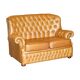 Small Chesterfield leather sofa with a high back.