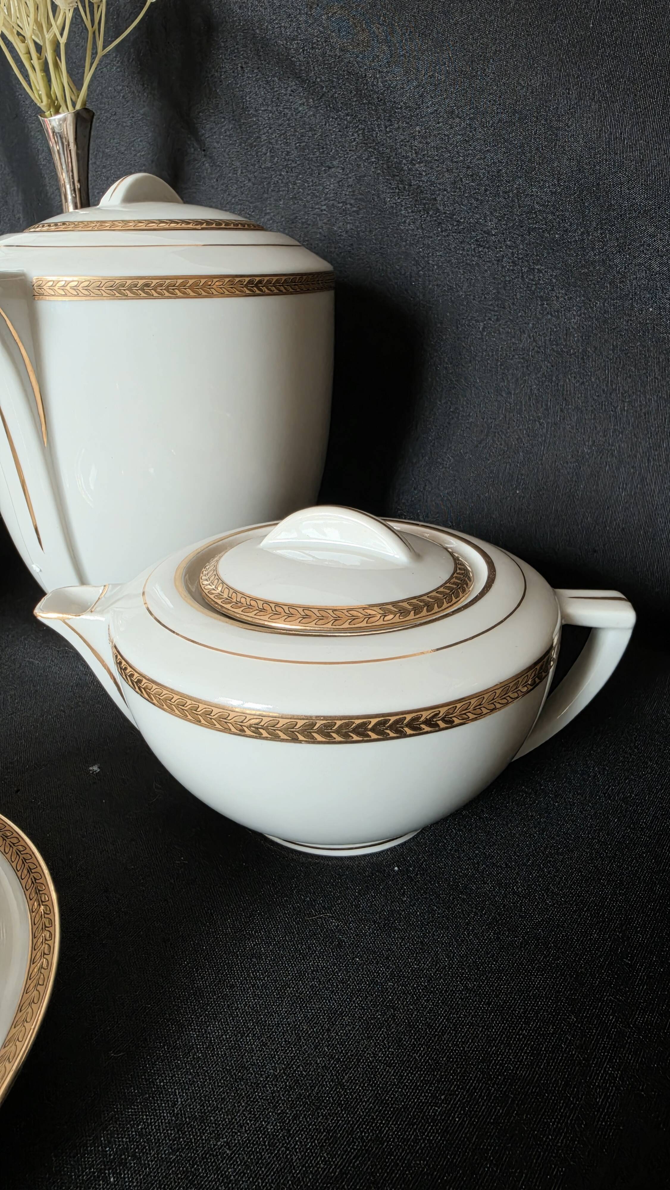 Coffee or tea service in Limoges porcelain and gold, France, Art style.