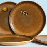 Quatre assiettes de potier en grès émaillé vintages