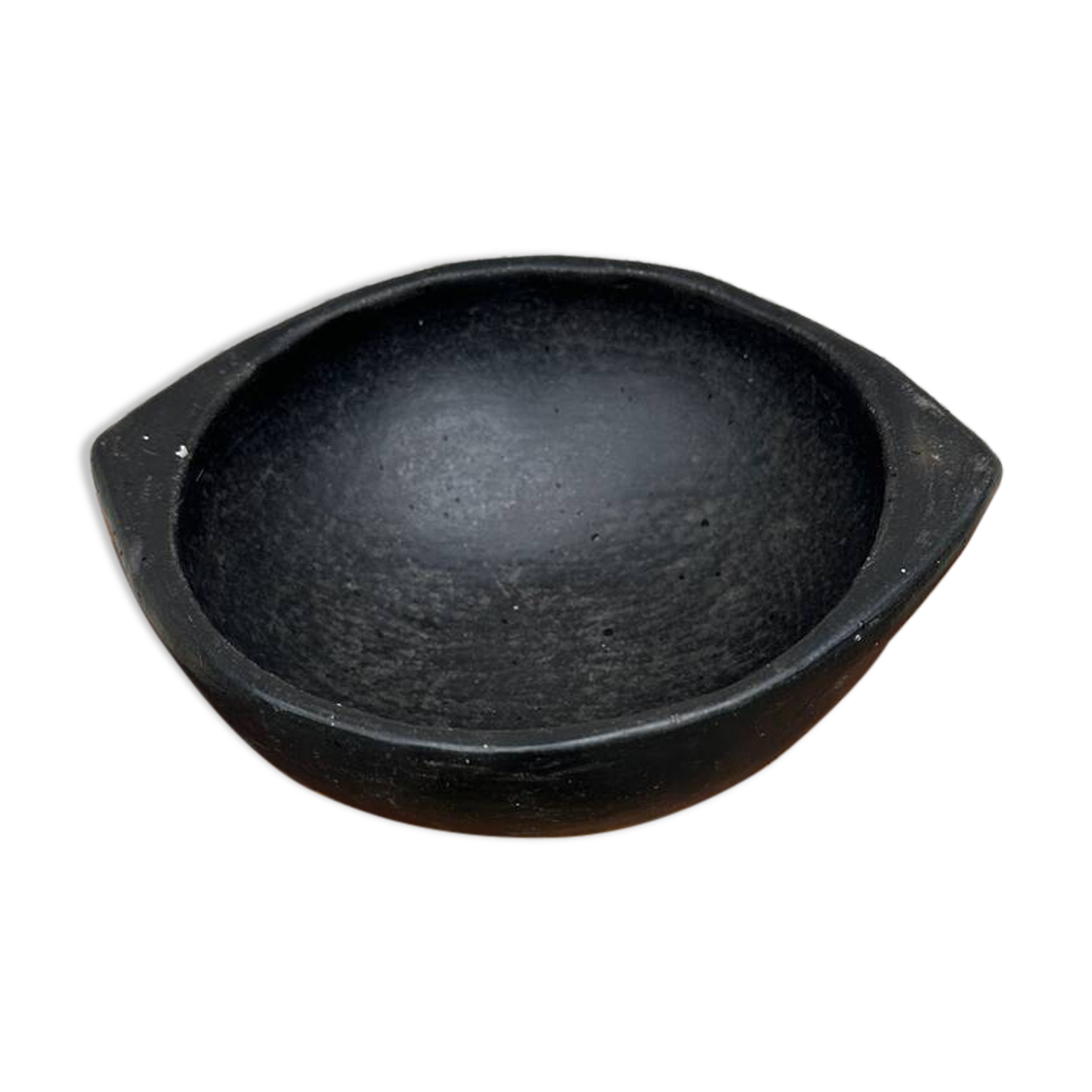 Ancient bowl, ethnic pottery in Colombian La Chamba ceramic.