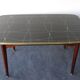 Folding table with black and gold painted glass, 1950