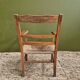 Straw and wood armchair