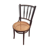 Curved wooden bistro chair and canning from the 50s and 60s