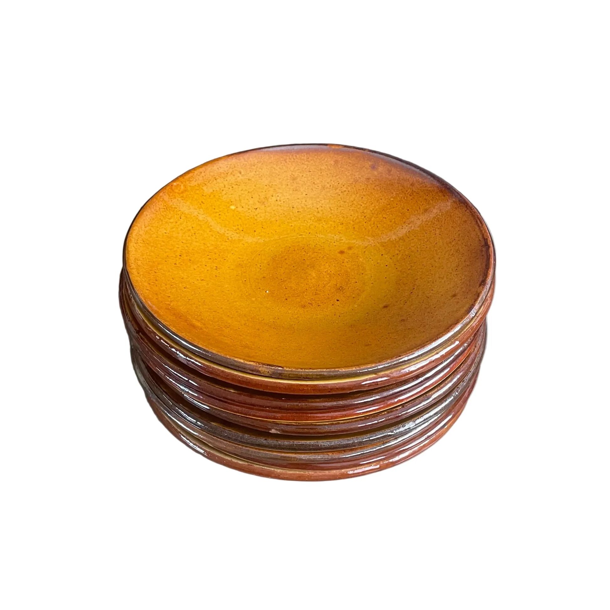 Set of 9 mustard earthenware plates.