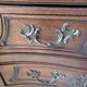 Antique corner cabinet in Louis XV style, topped with a marble surface.