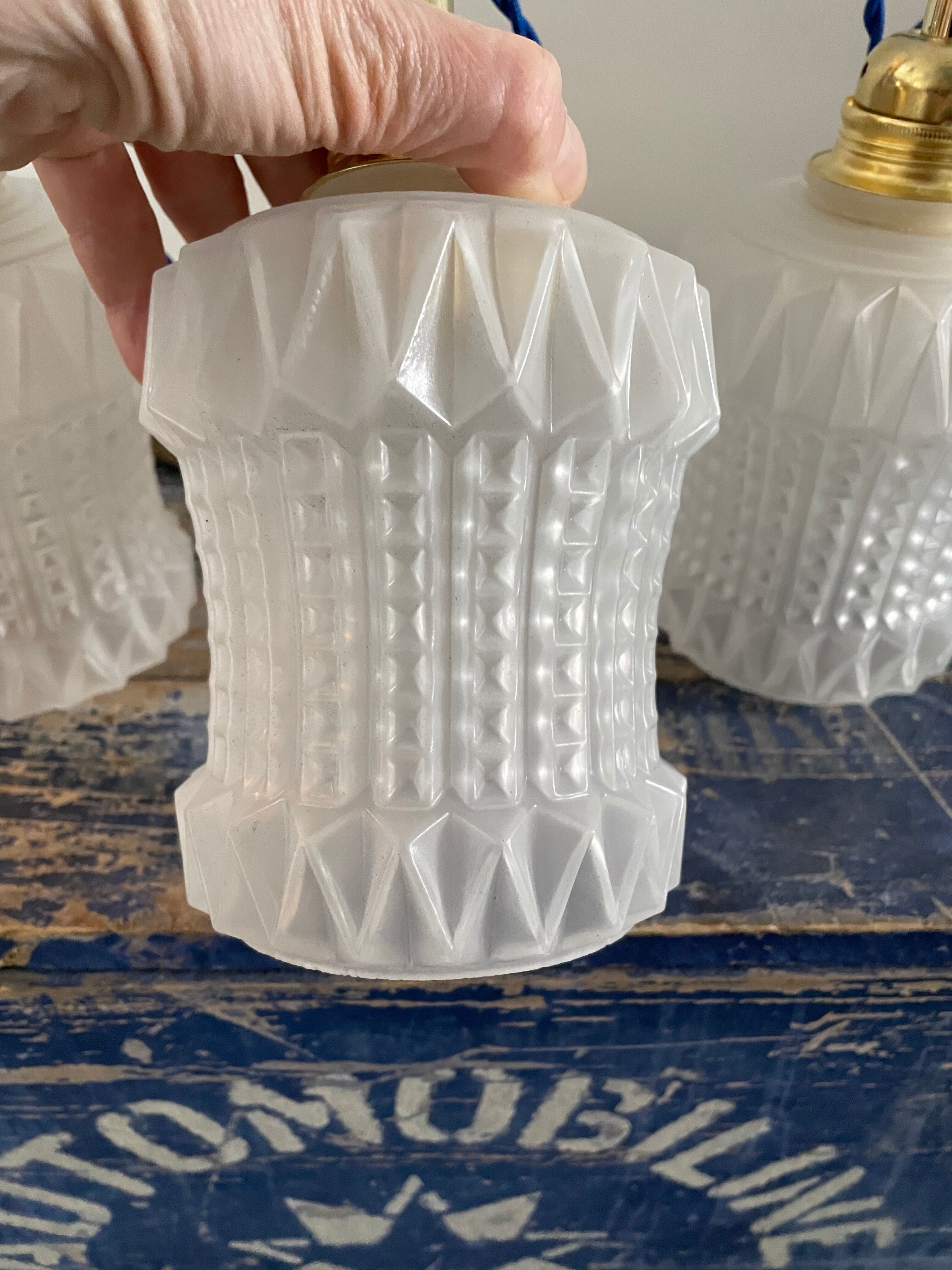 Set of three vintage electrified white glass pendant lamps with new