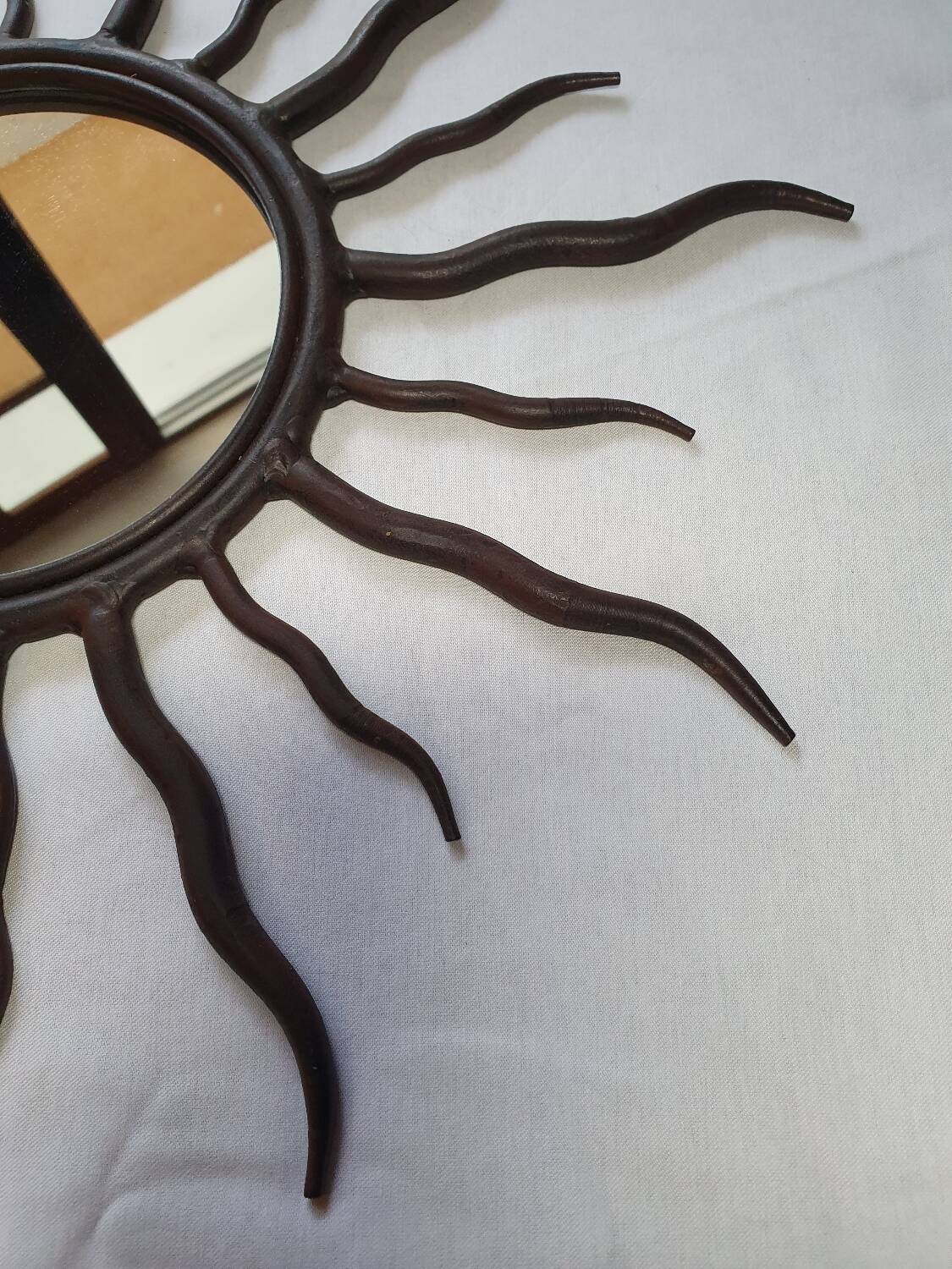 Solid wrought iron sun mirror
