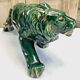 Art Deco lion statue cracked St Clement
