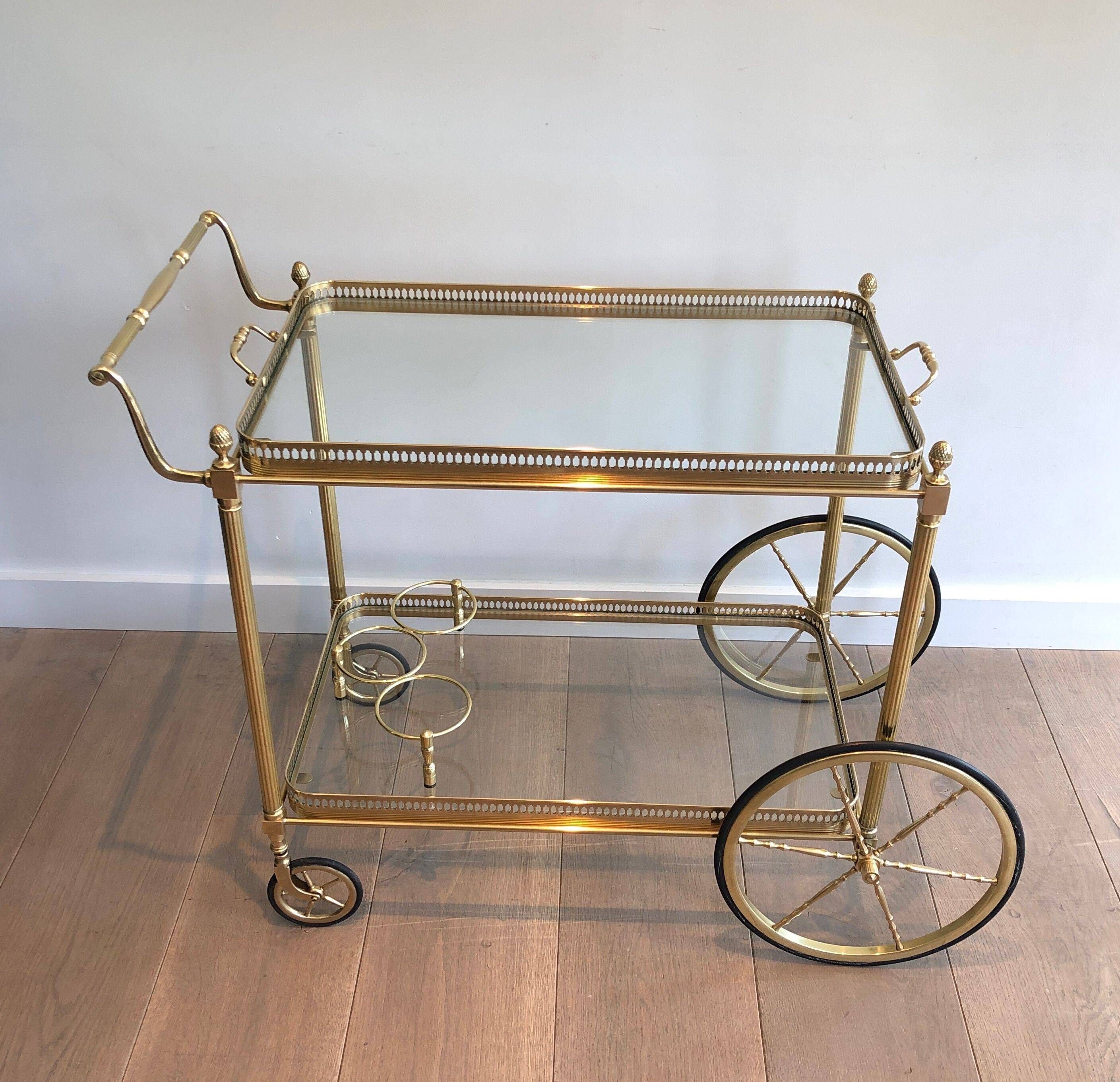 Brass rolling table with removable double trays from Maison Jansen.