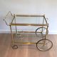 Brass rolling table with removable double trays from Maison Jansen.