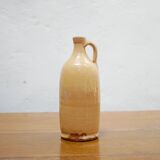 Vintage glazed terracotta bottle