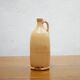 Vintage glazed terracotta bottle