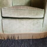 Fringed velvet armchair