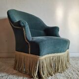 Green velvet toad armchair with fringes