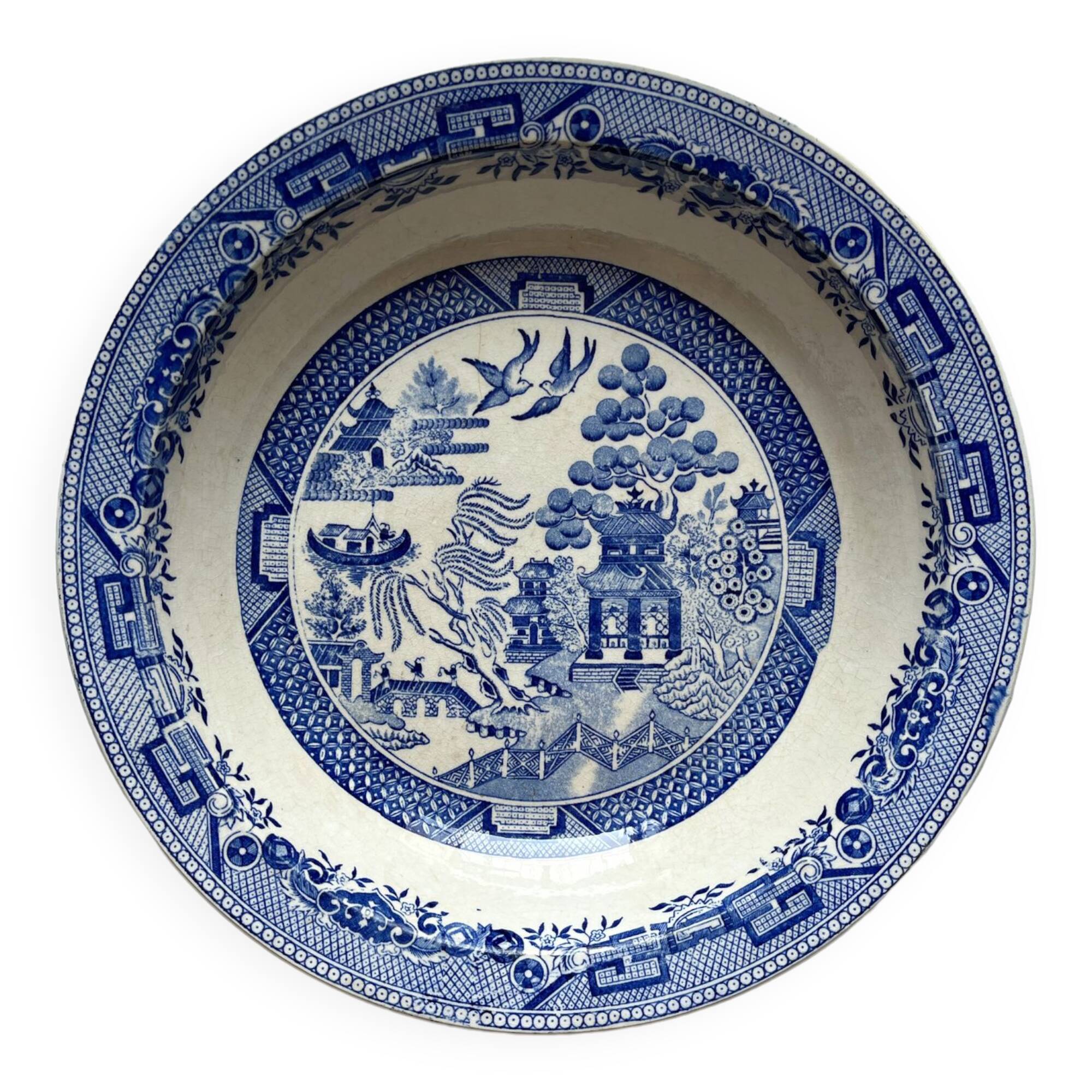 Hollow ironstone dish with blue Japanese decor
