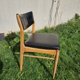 Scandinavian chair with faux leather seat and back