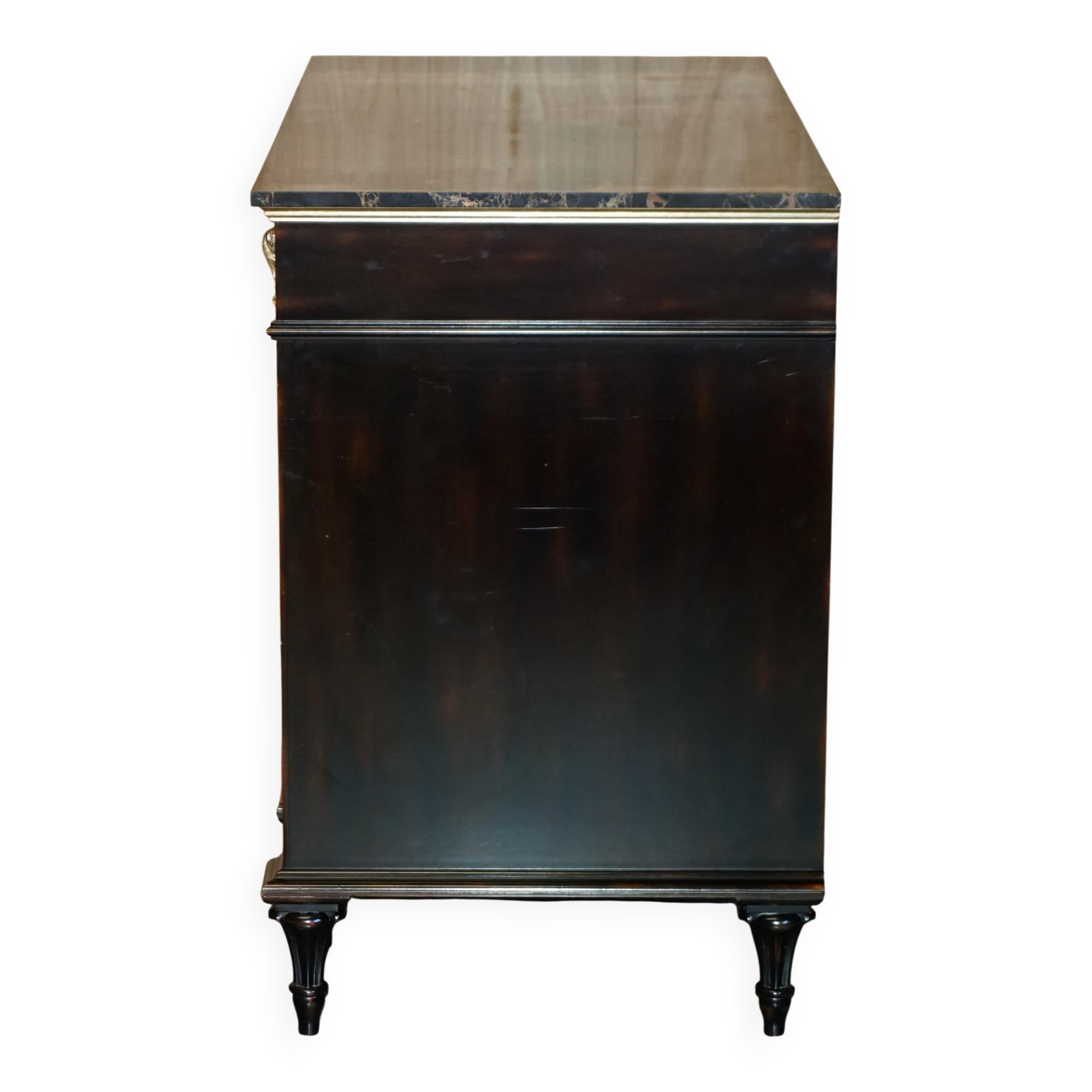 Contemporary Chinese buffet with a marble top and space for a mini-fridge.