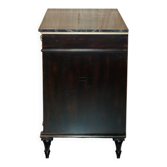 Contemporary Chinese buffet with a marble top and space for a mini-fridge.