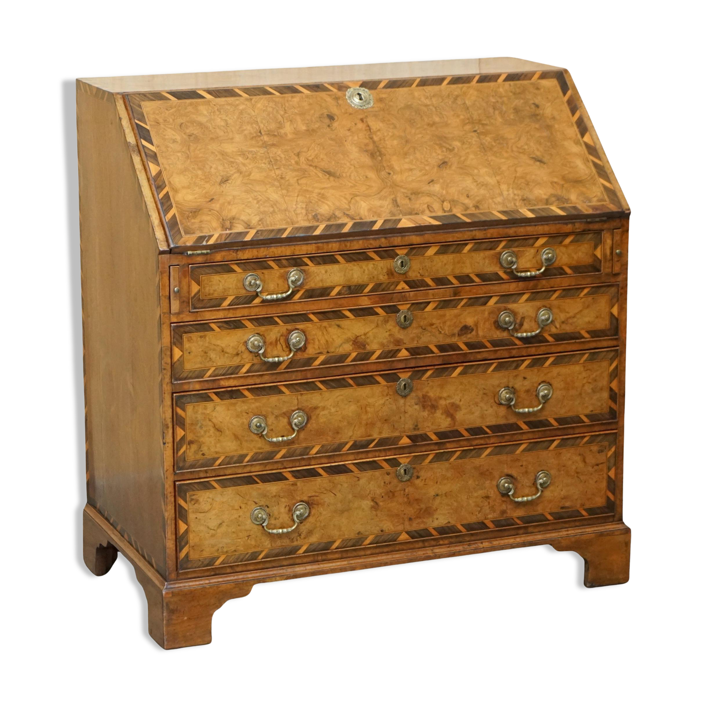 Antique George II bureau from 1740 in walnut, rosewood, and leather.