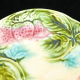 Plate in slurry with strawberry decoration and strawberry leaf