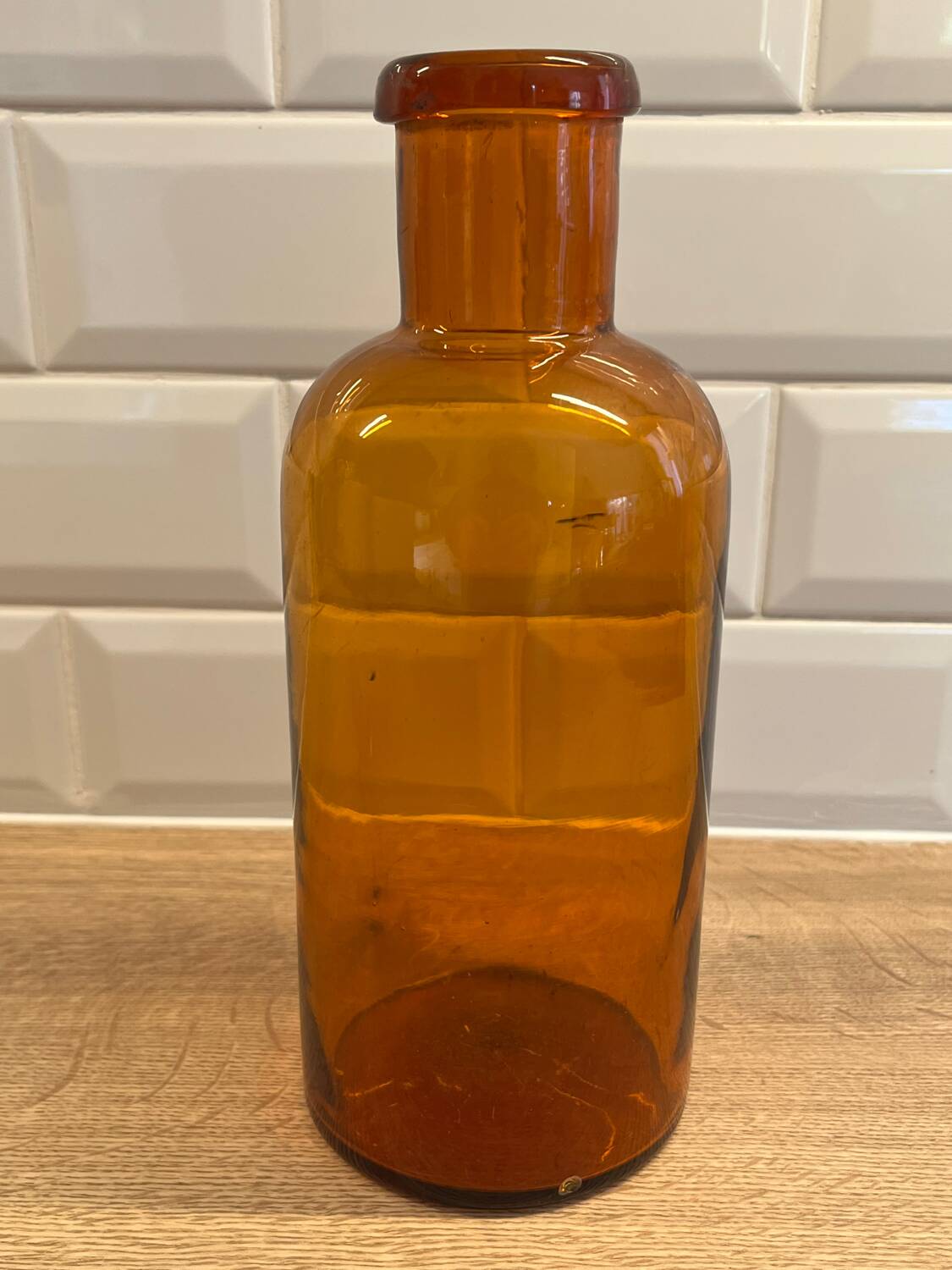 Amber glass bottle vase