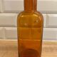 Amber glass bottle vase