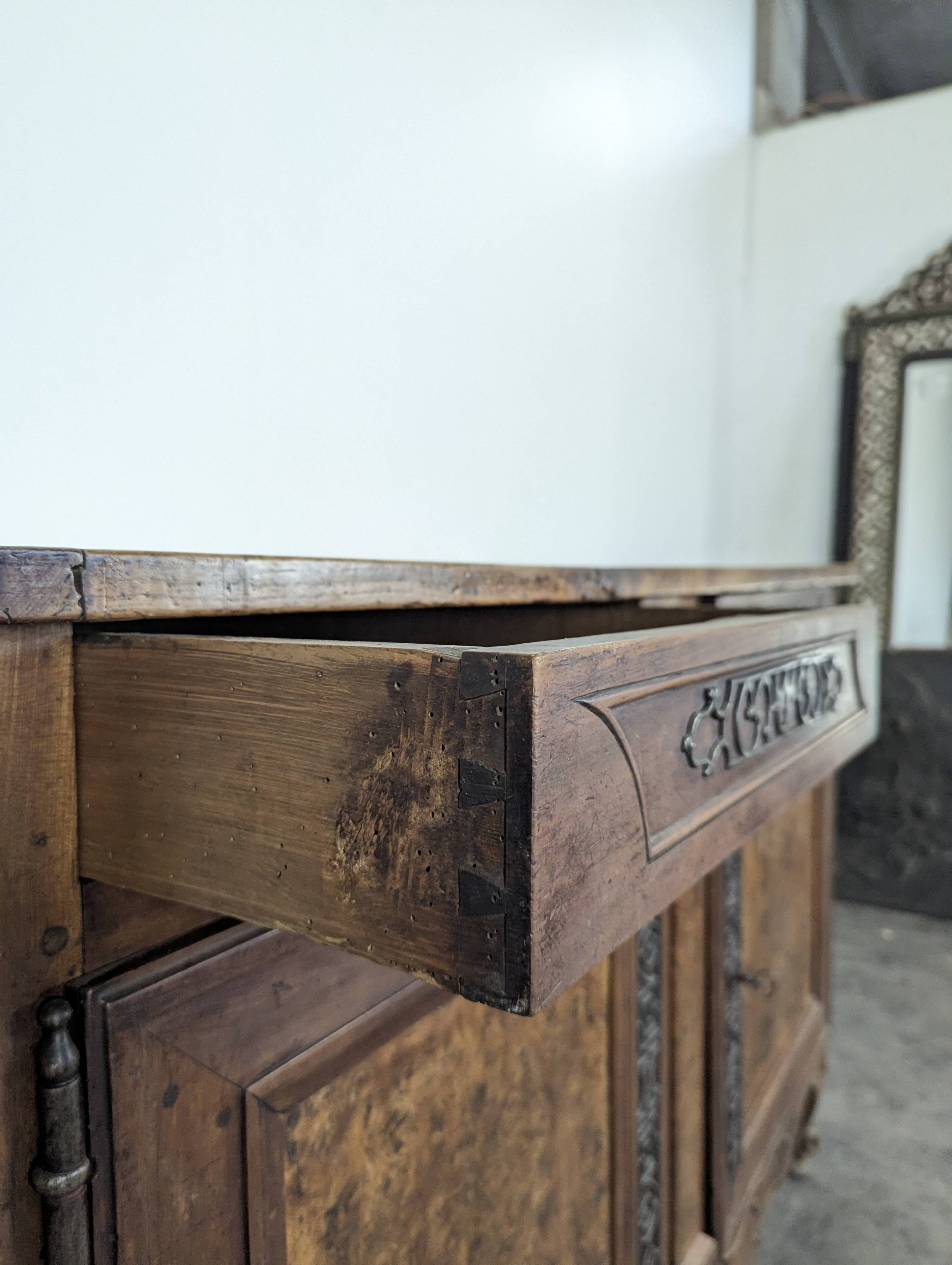 Louis XV-style buffet in walnut and burl with openwork fittings.