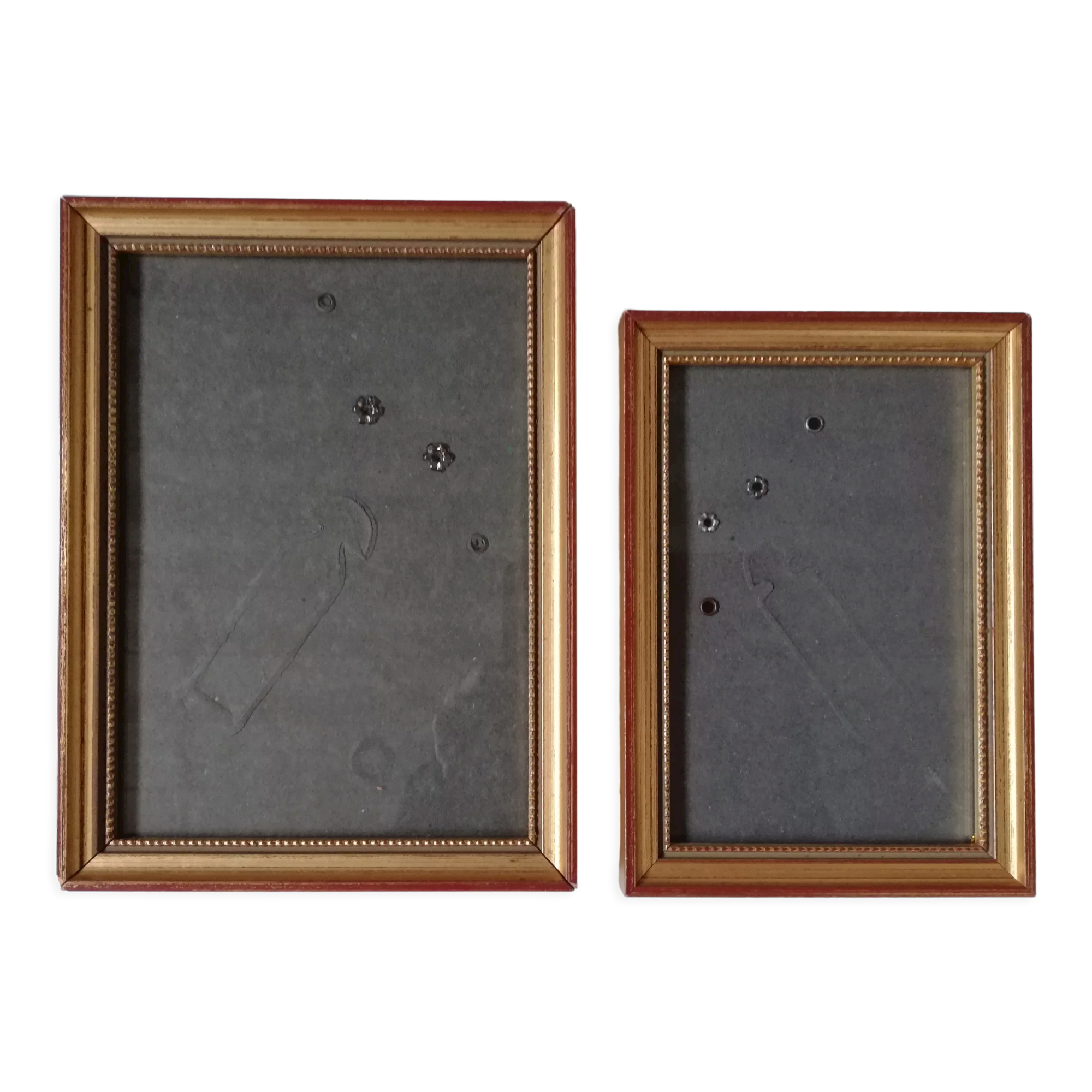 Pair of photo frames under glass, gilded wood