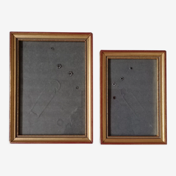 Pair of photo frames under glass, gilded wood