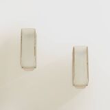 Pair of modernist wall sconces in nickel-plated steel and opaline glass, 1930.