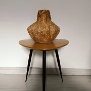 Textured terracotta vase in wabi-sabi style